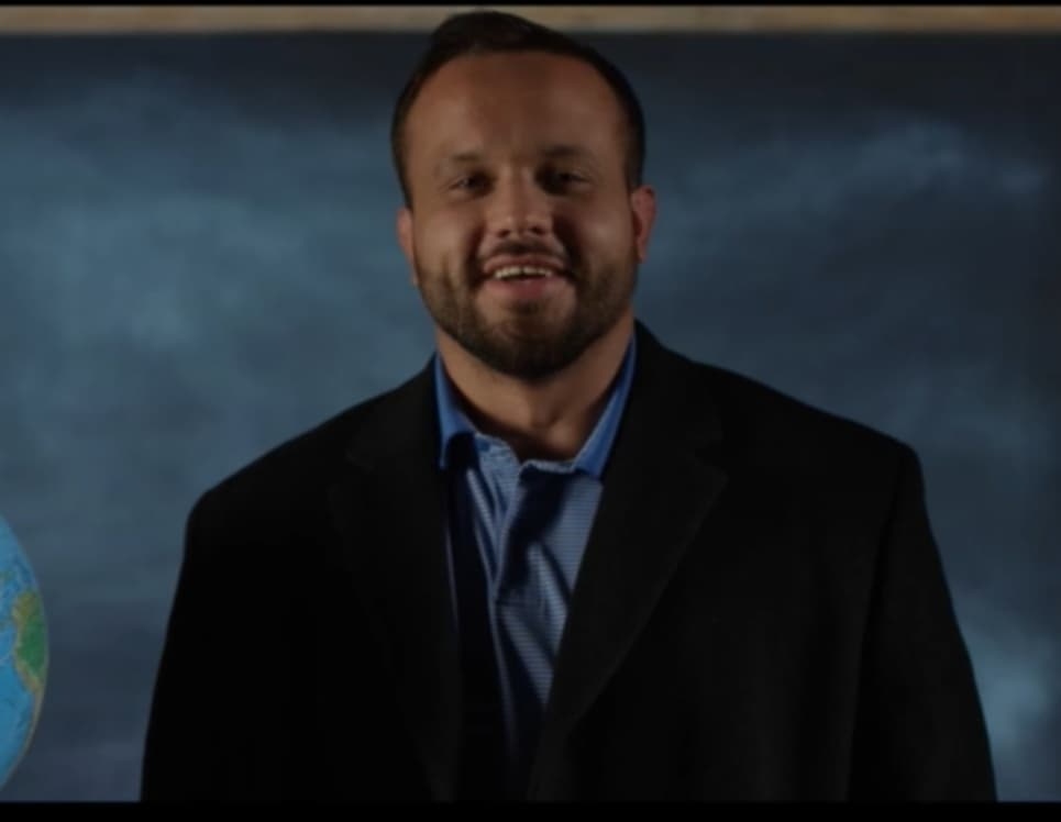 Language Monk teacher in a colorful Spanish-speaking neighborhood